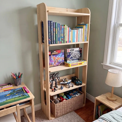Unfinished pine book and toy storage shelf in a kids room