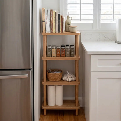 Slim red oak shelving unit between a refrigerator and kitchen counter for pantry storage