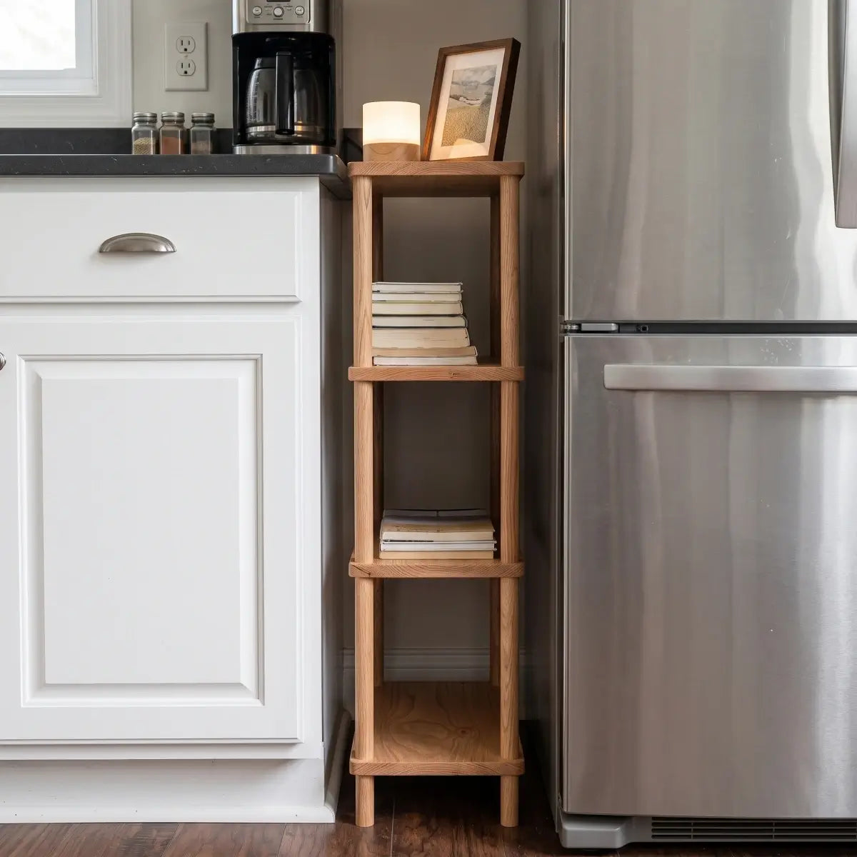 Narrow solid red oak storage shelf beside a refrigerator for compact kitchen organization
